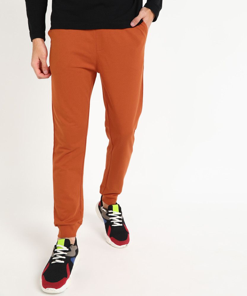 FOREVER 21 Solid Men Orange Track Pants Buy FOREVER 21 Solid Men Orange Track Pants Online at Best Prices in India Flipkart