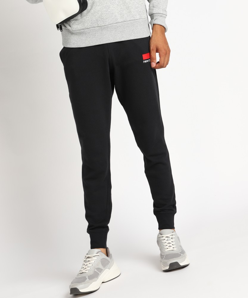 New Balance Solid Men Black Track Pants - Buy New Balance Solid Men Black  Track Pants Online at Best Prices in India
