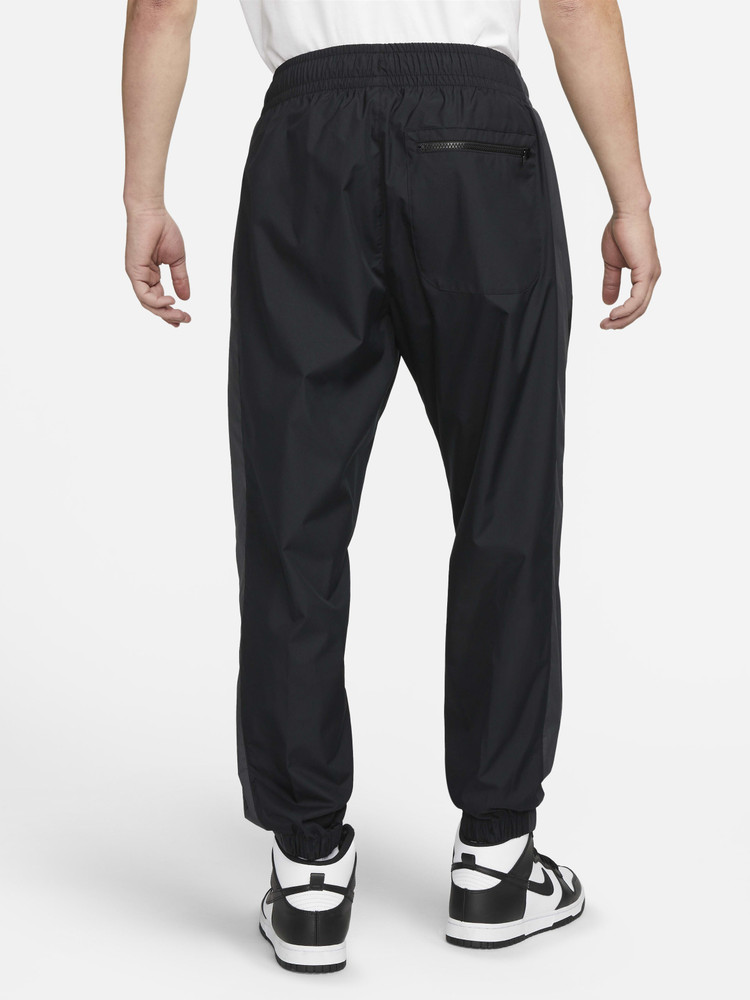 Nike guppy track pants 2025
