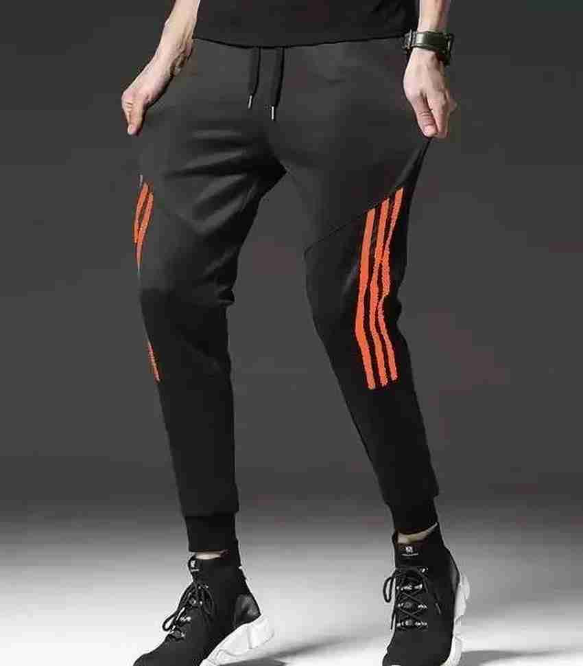 Graphic track pants shop