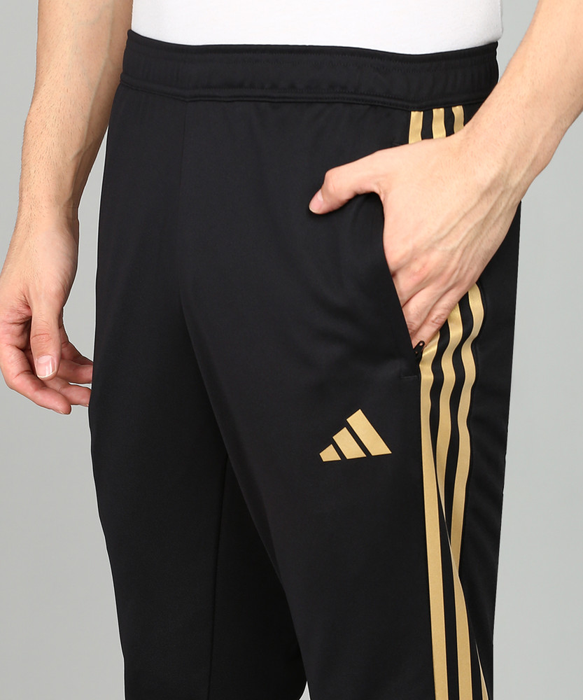 gold adidas tiro pants