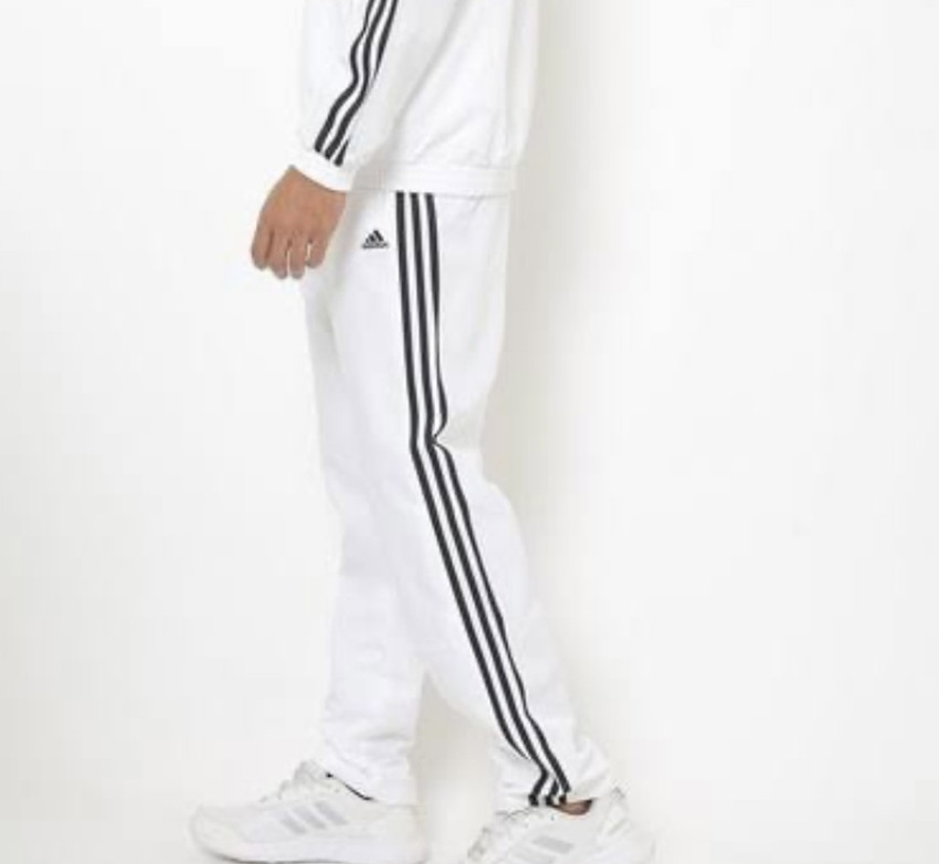 White track pants with black stripe top