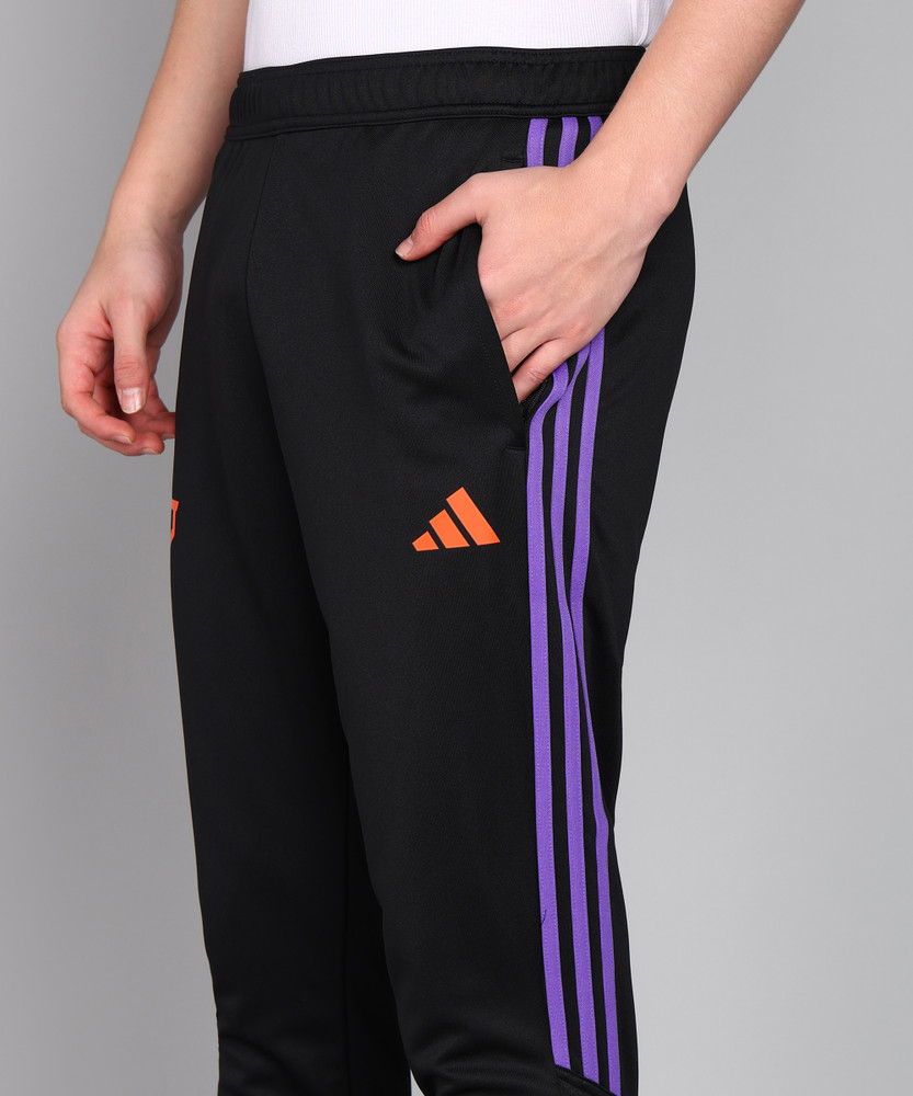 black and purple adidas pants
