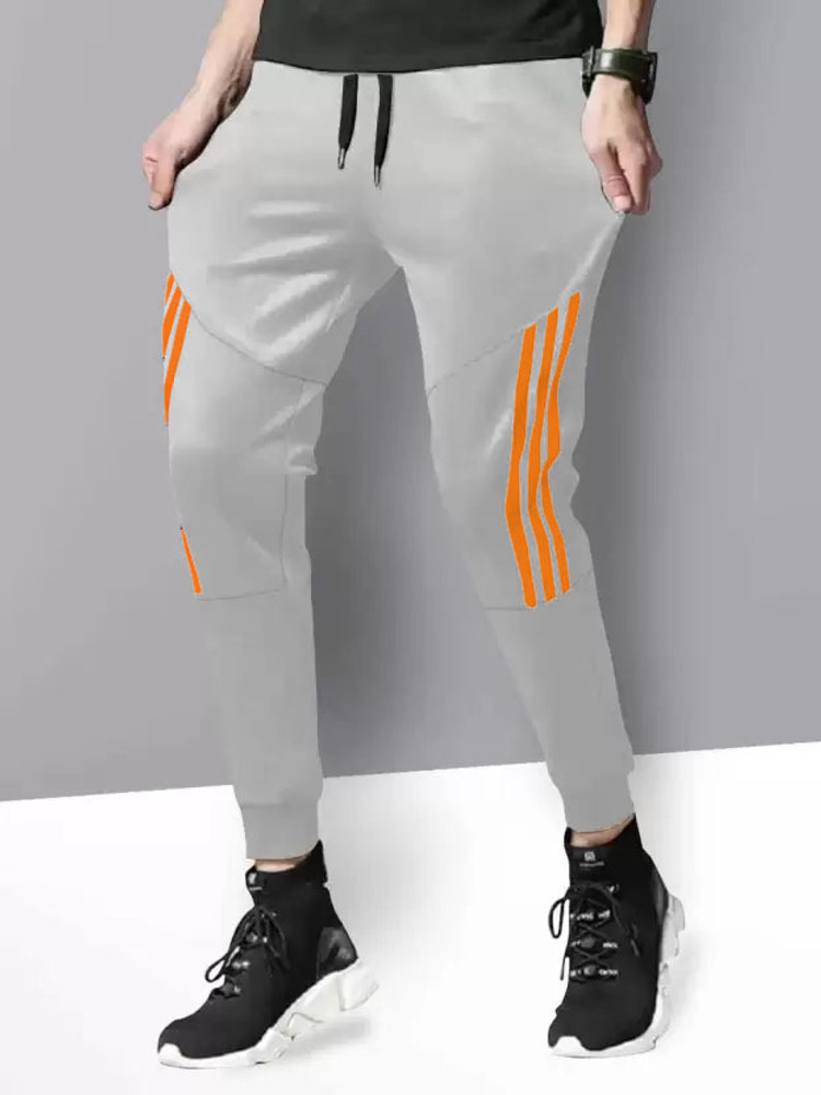 grey and orange adidas track pants