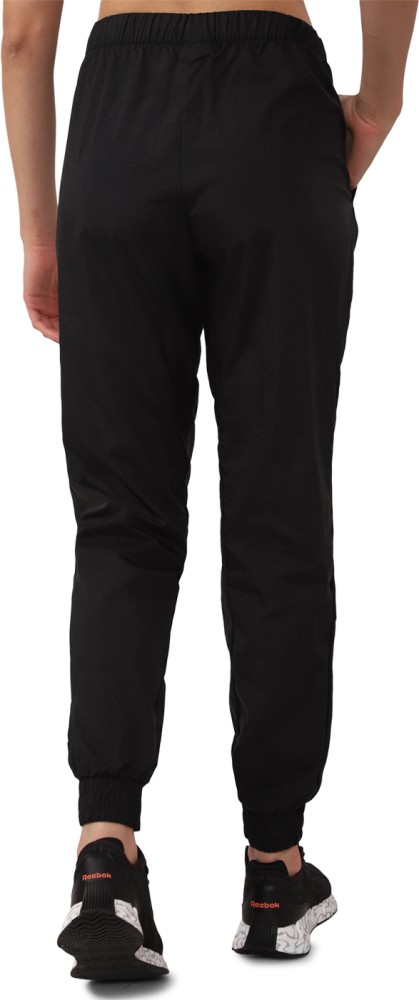 REEBOK Solid Women Black Track Pants - Buy REEBOK Solid Women