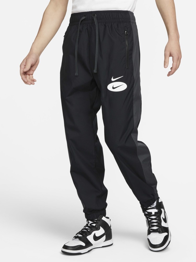 NIKE AS M NSW SL WVN UL PANT Printed Men Black Track Pants - Buy