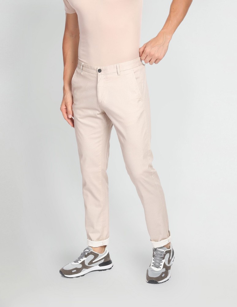 Arrow Sports Men White Bronson Slim Fit Solid Casual Trousers Buy Arrow  Sports Men White Bronson Slim Fit Solid Casual Trousers Online at Best  Price in India  NykaaMan