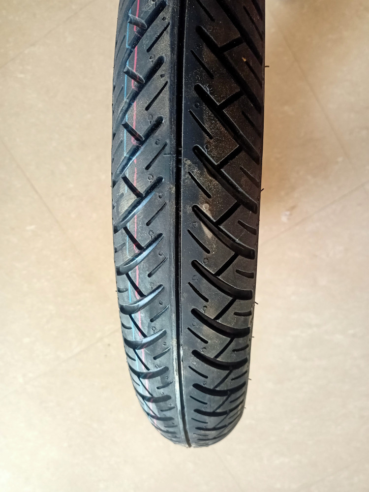 Two wheeler tyre price mrf sales