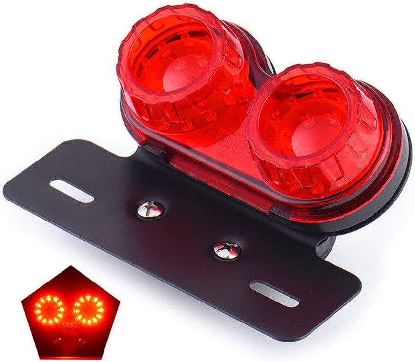 Motorcycle tail light with shop integrated turn signals