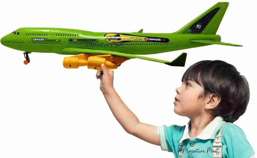 Green airplane on sale toy