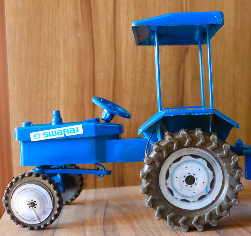 Orange tractor toy on sale