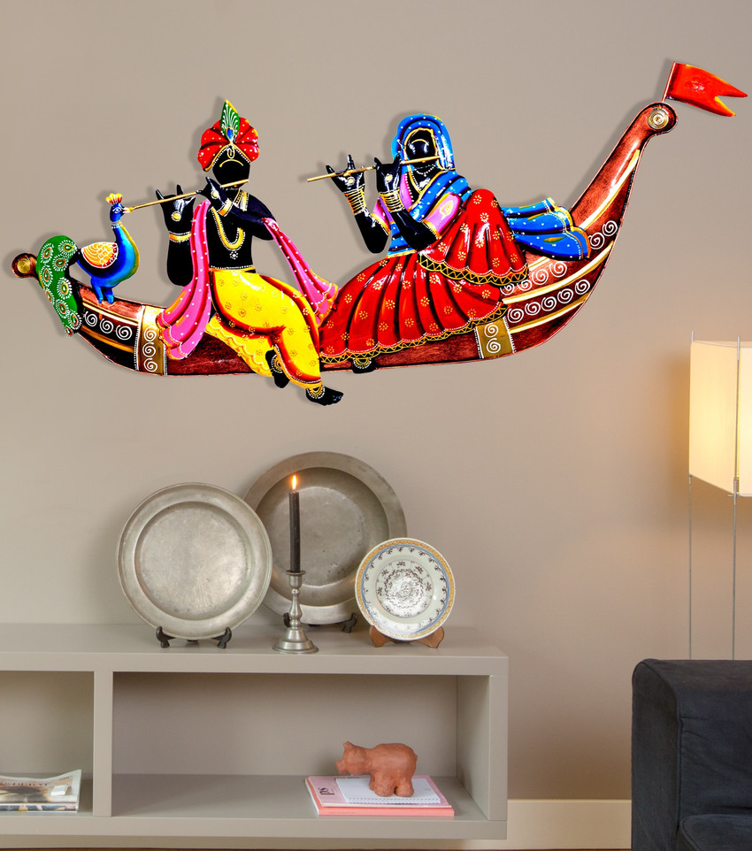 Hanging pictures on large wall top