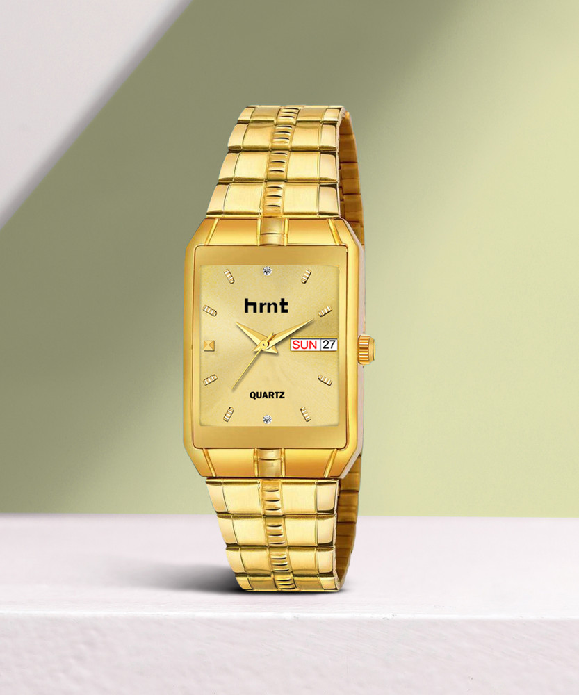Hand watch golden colour shop