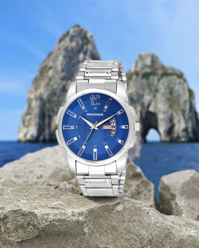 analog watch with date and day display