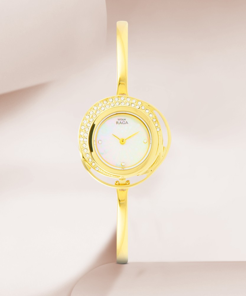 Titan raga golden color on sale watch