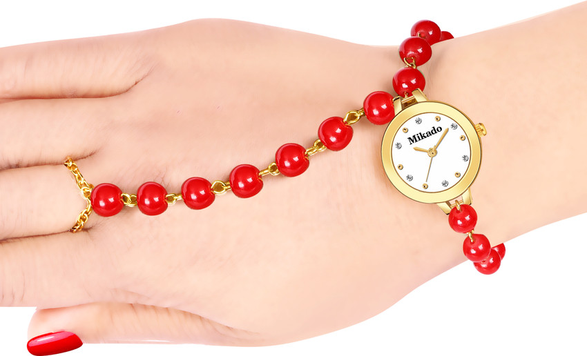 Watch with ring attached outlet