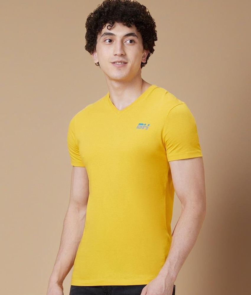 BEING HUMAN Solid Men V Neck Yellow T Shirt Buy BEING HUMAN
