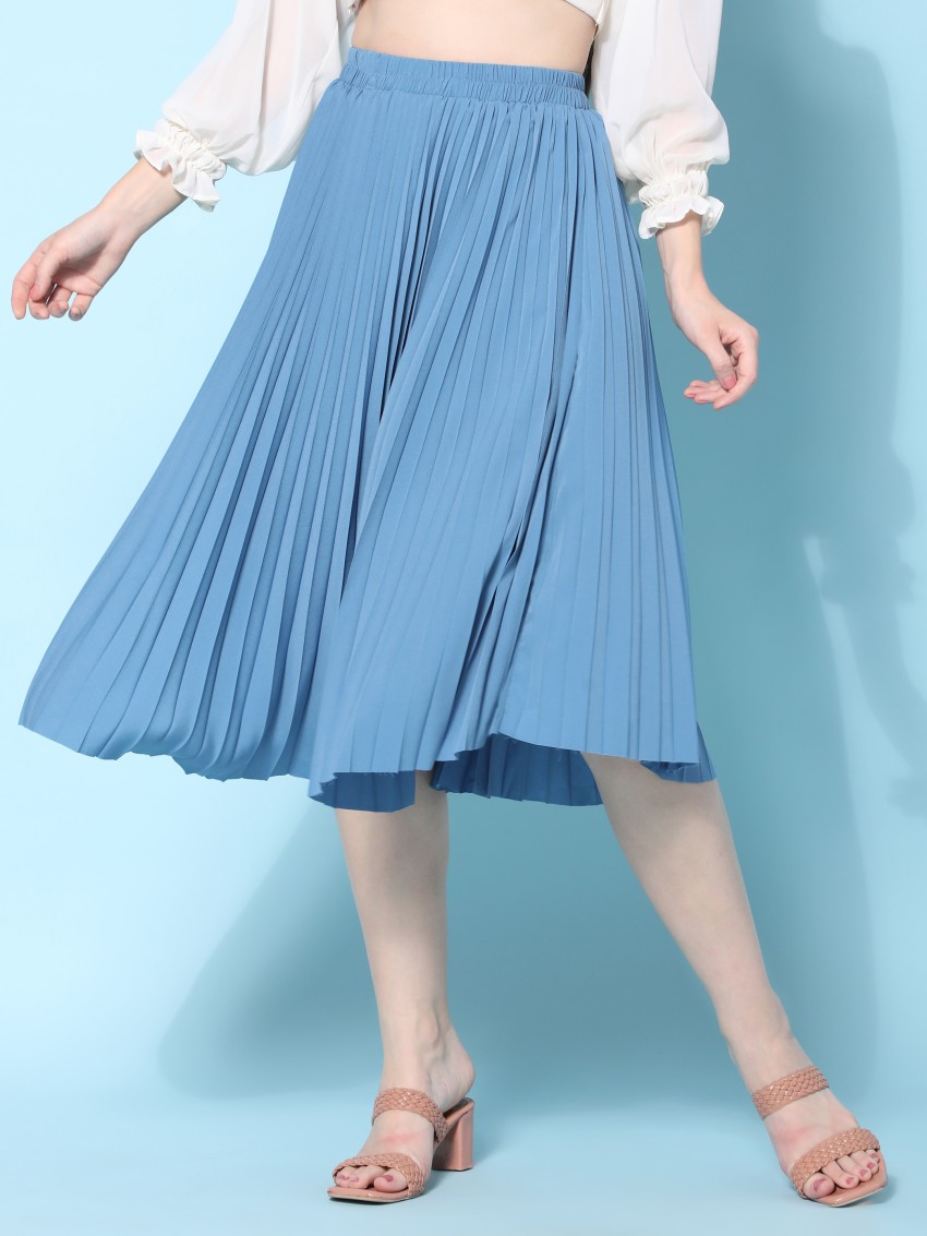 bright blue pleated skirt