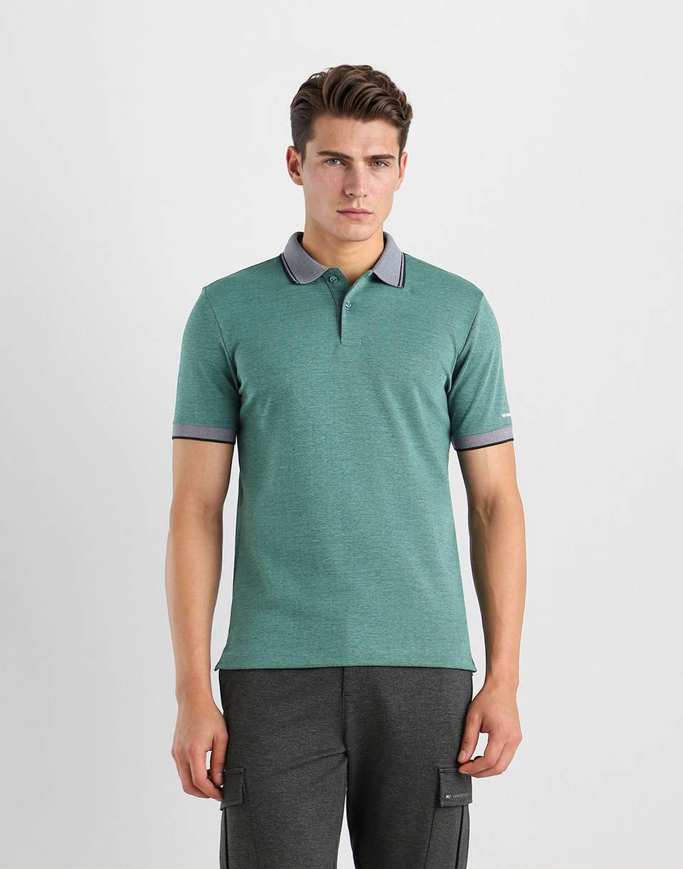 VAN HEUSEN Solid Men Polo Neck Dark Green T-Shirt - Buy VAN HEUSEN ...