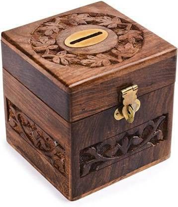 Wooden piggy bank is use to saving pocket money or this product is made by pure shisham wood work mughal carving . Coin Bank (Brown) Coin Bank-image-35