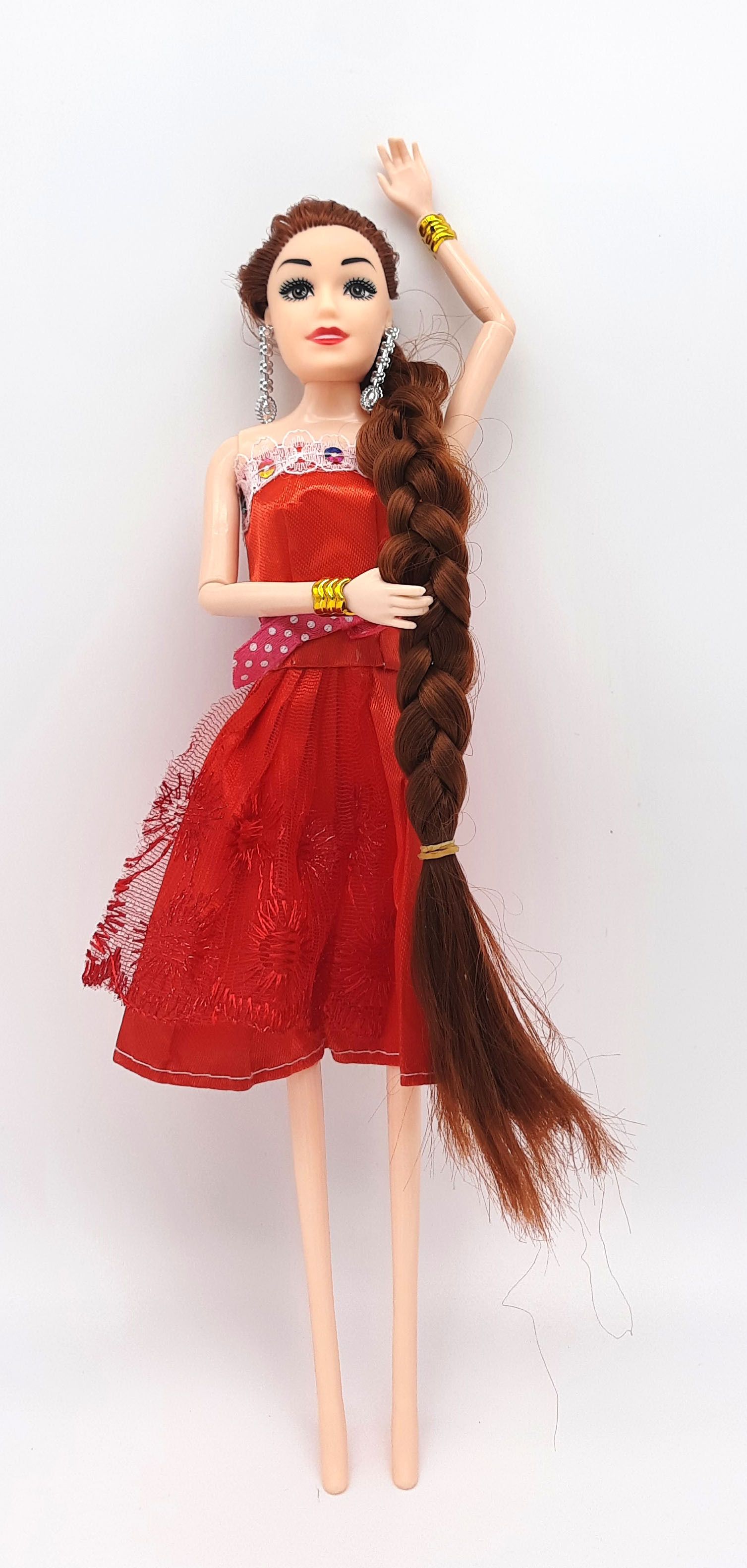 Our doll features long hair that can be styled with the included comb .-image-41