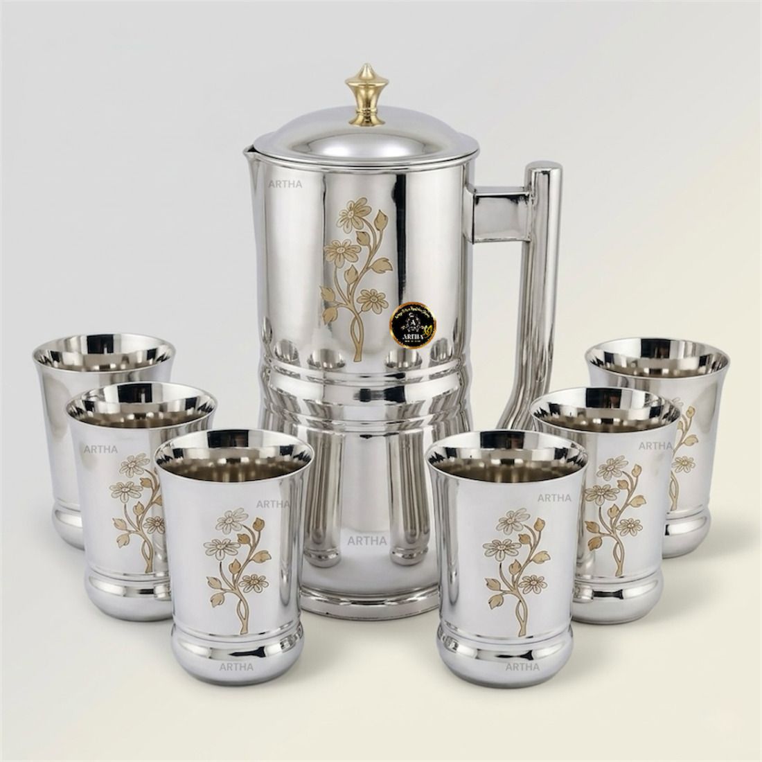 Artha Modern And Attractive Design Pack Of 7 Stainless Steel Jug Glass Set Of 7 Include 1 jug 2 Litre Capacity With Brass Knob On Lid And 6 Glasses 400 ML Each Both Mirror Polished And Laser Printed Jug Glass Set-image-44