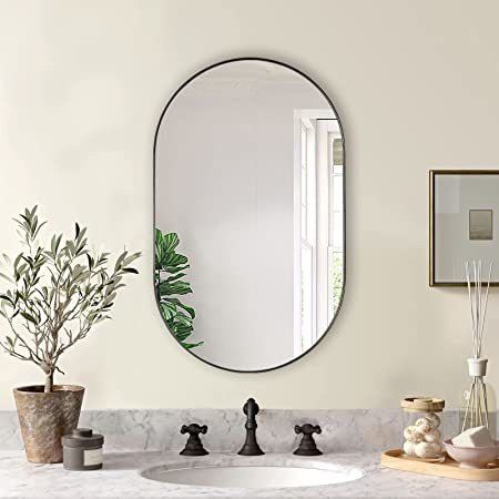 12"inch by 18"inch CAPSULE MIRROR. PERFECT FOR ANY WALL OF HOME. Bathroom Mirror