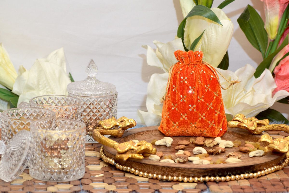 Women Orange Potli-image-23