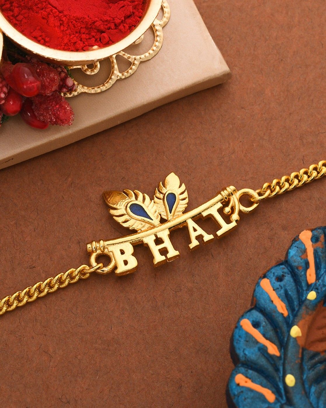 voylla Designer Peacock Feather Motif Gold Tone Bhai Rakhi Assorted Chawal Roli Pack Set-picture-46