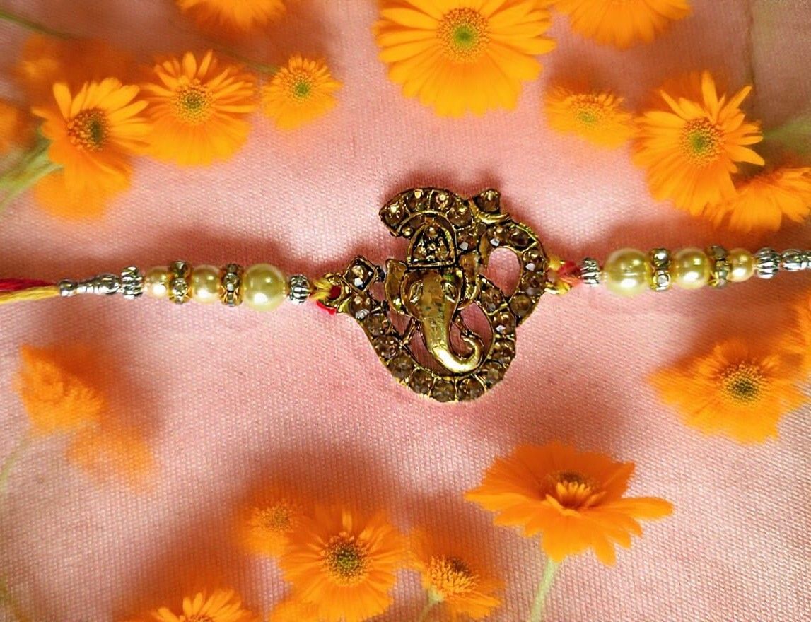 Designer Religious Rakhi Gold Finish Chawal Roli Pack Set-image-13