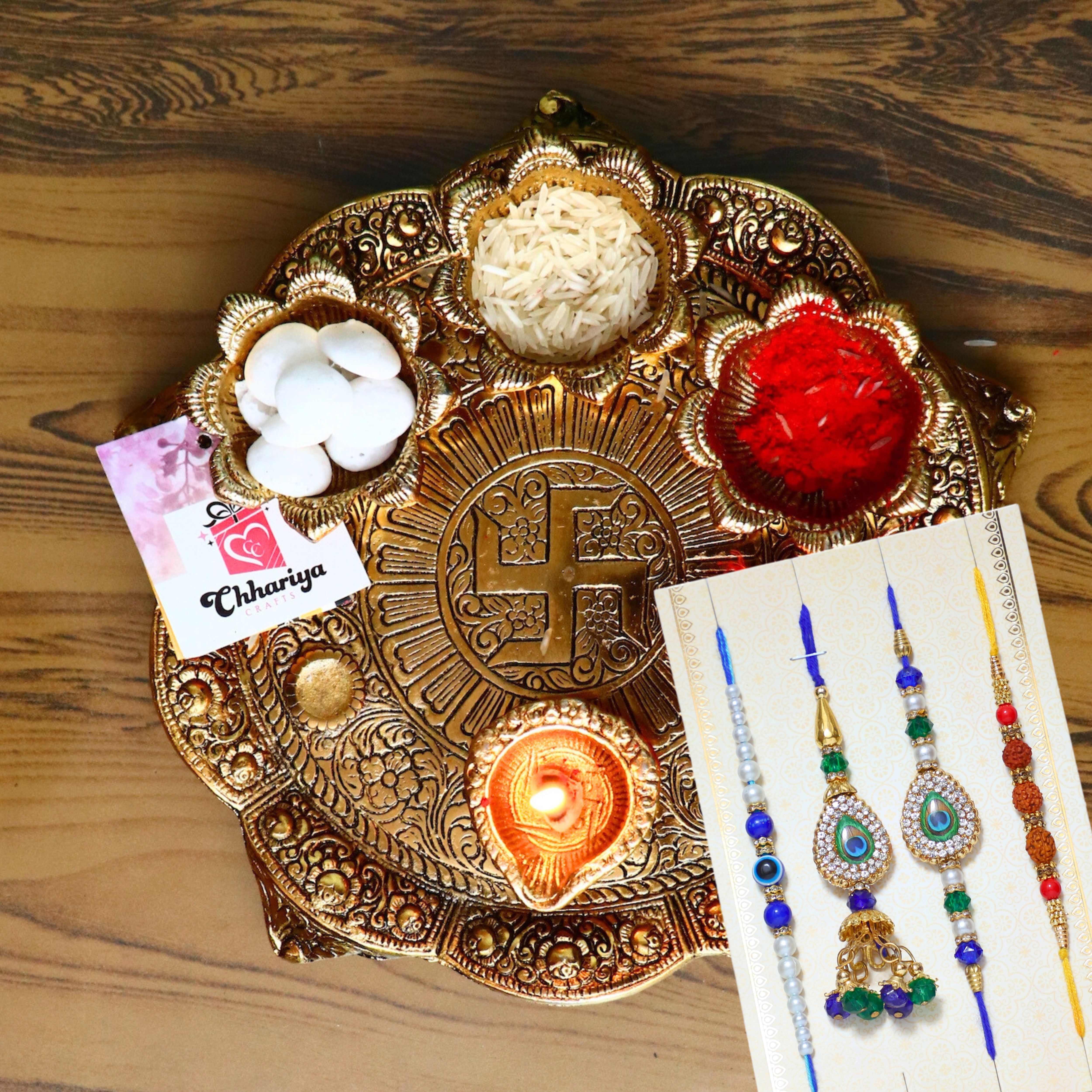 chhariya crafts Bhaiya Bhabhi Bhaiya Bhabhi Rakhi Combo Gift Set 1 Metal Pooja Thali, Chawal Roli Pack, 1 Designer Lumba Rakhi For Bhabhi, 1 Designer Rakhi For Bhaiya Brother, 2 Extra Rakhi ) Assorted, Gold Finish, Kundan, Pearl, Plastic (PVC) Rakhi, Thali, Chawal Roli Pack Set-picture-18