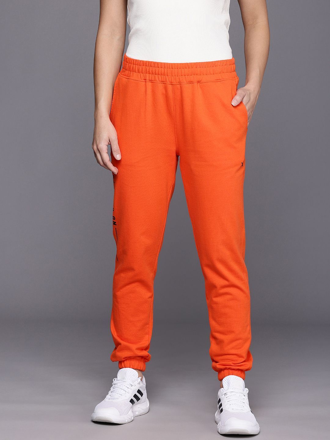 Women Solid Orange Track Pants-image-28