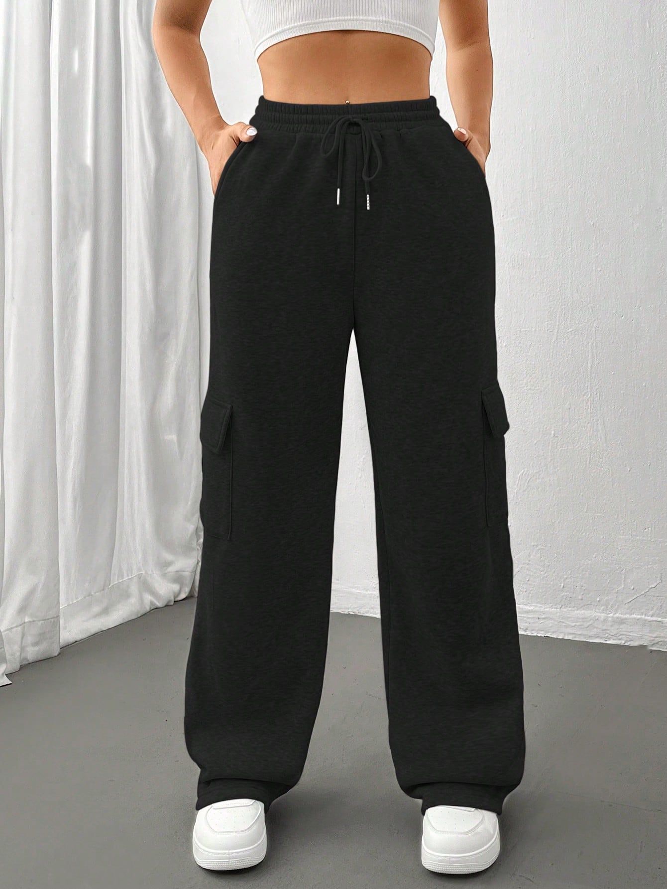Women Solid Black Track Pants