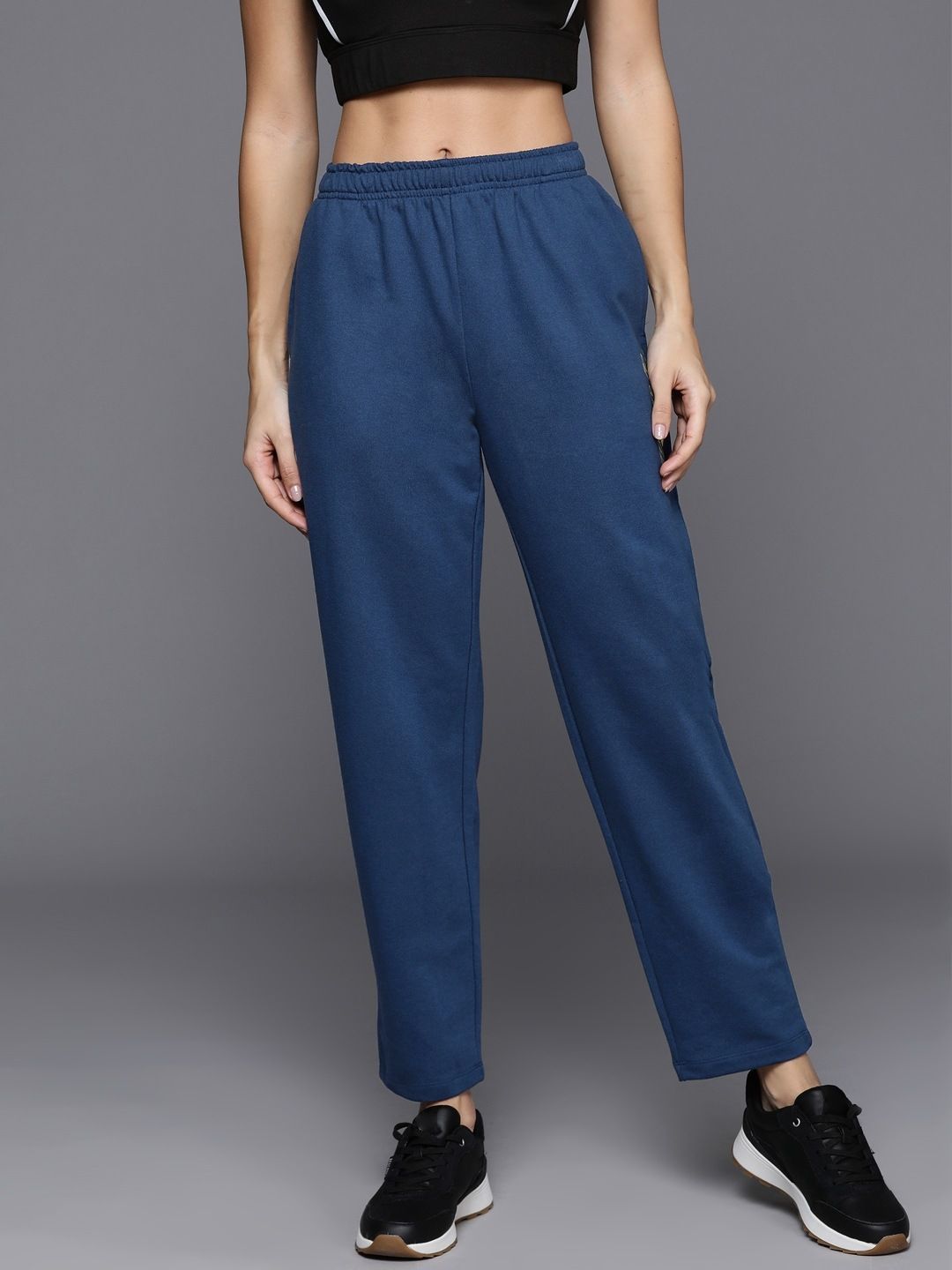 Women Solid Green Track Pants